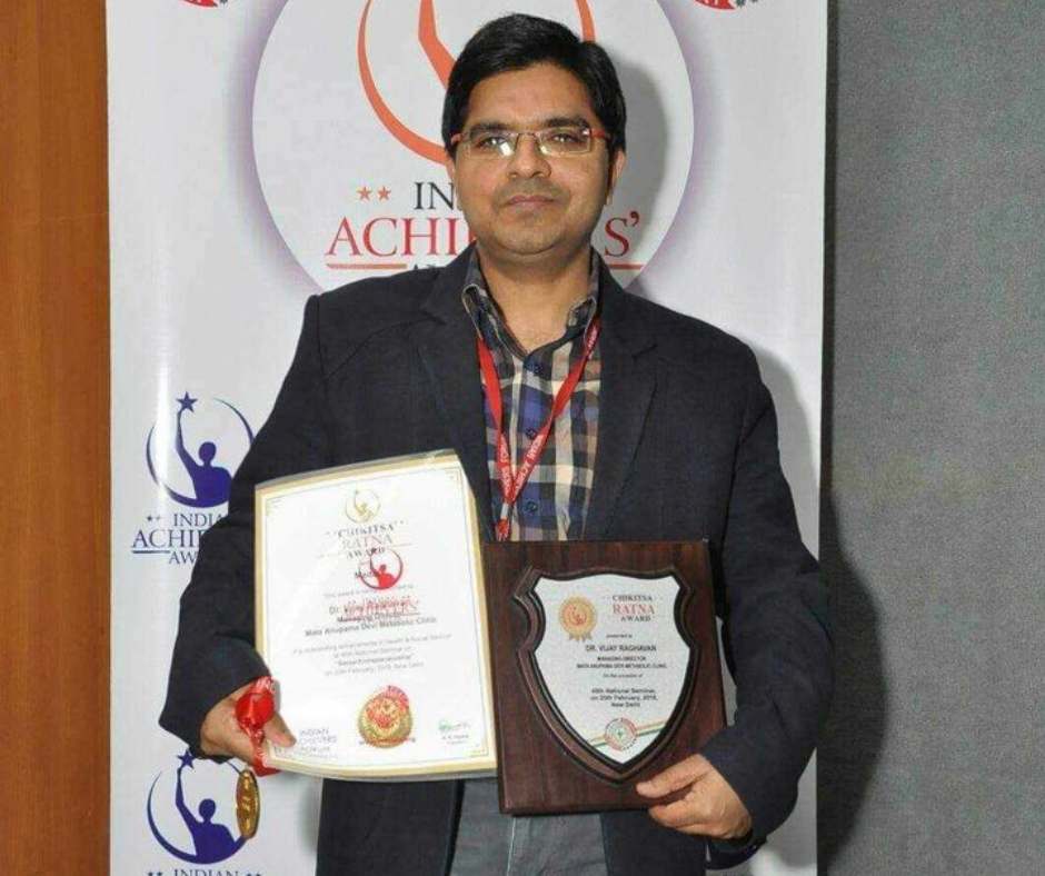 Dr Vijay Receiving Award 1
